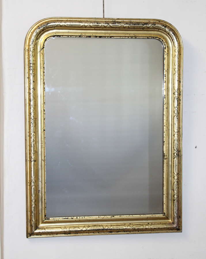 Antique archtop mirror with lemon gold frame
