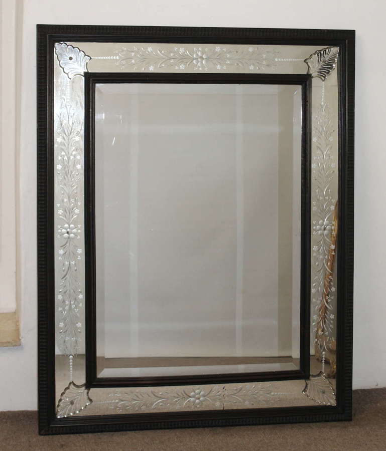 Handsome antique Venetian mirror with ebonised borders