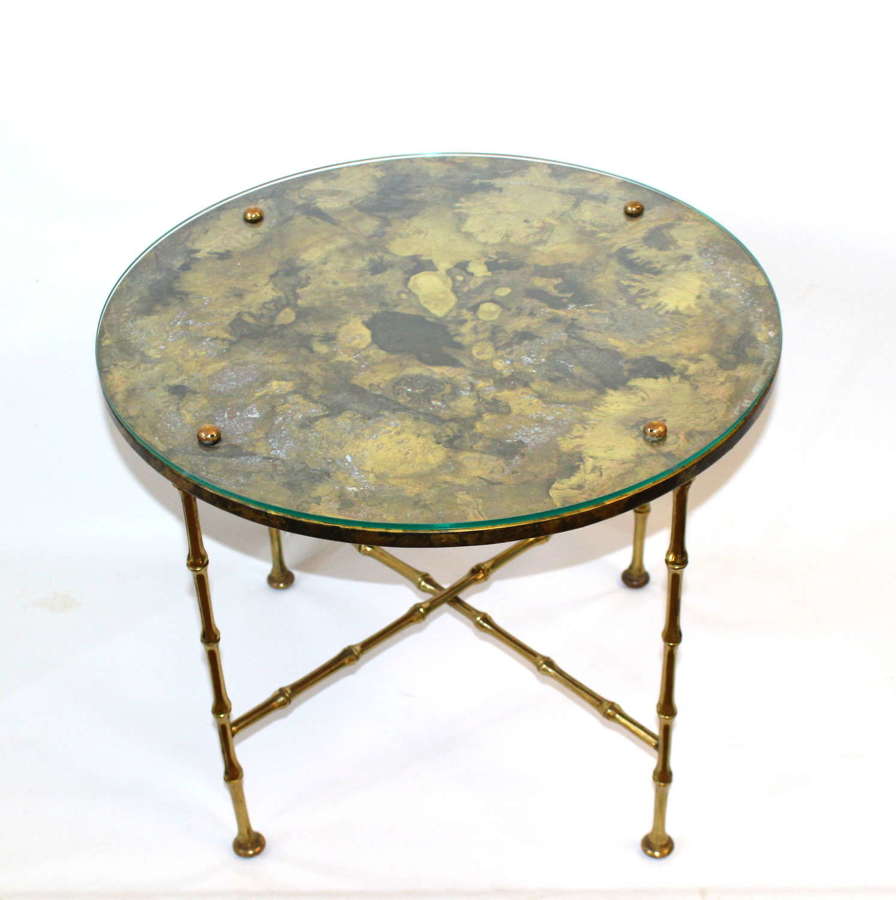 Vintage circular low table with decorative glass top