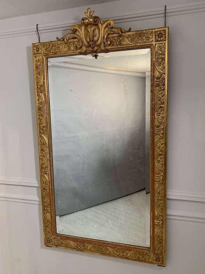 Rectangular gilt gesso mirror with cartouche