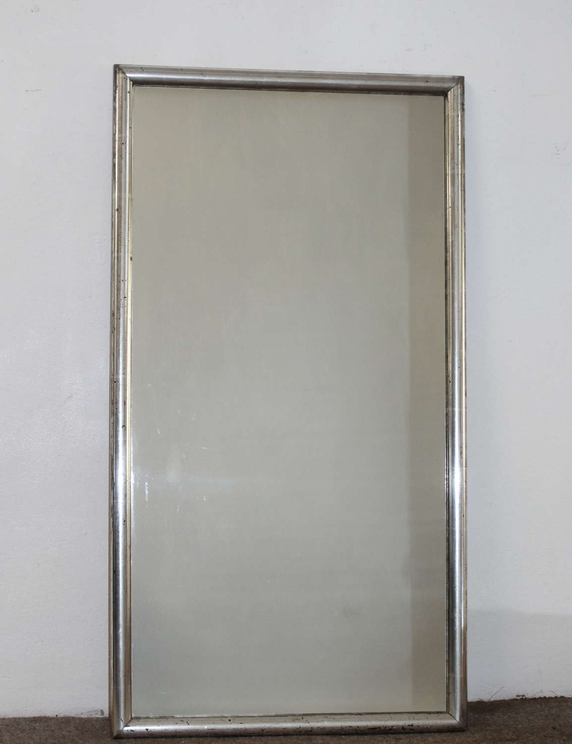 Compact antique French silverleafed bistro mirror