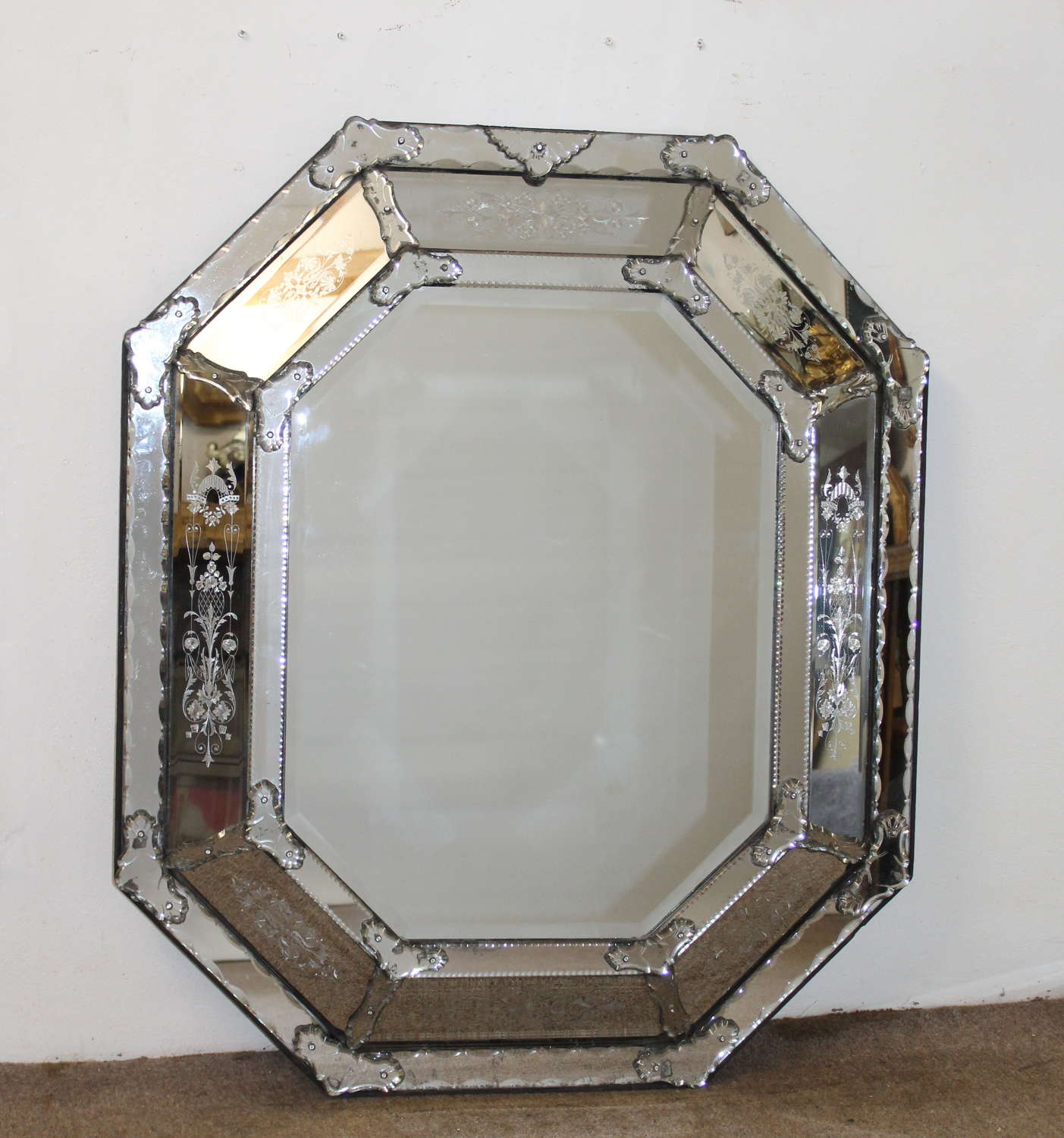 Magnificent antique cushioned Venetian mirror
