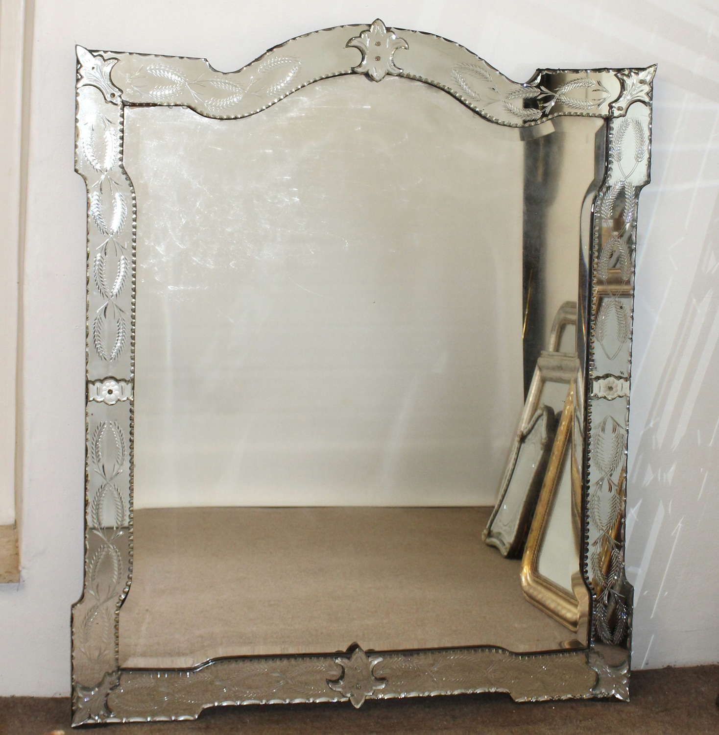 Large and wide antique Venetian mirror