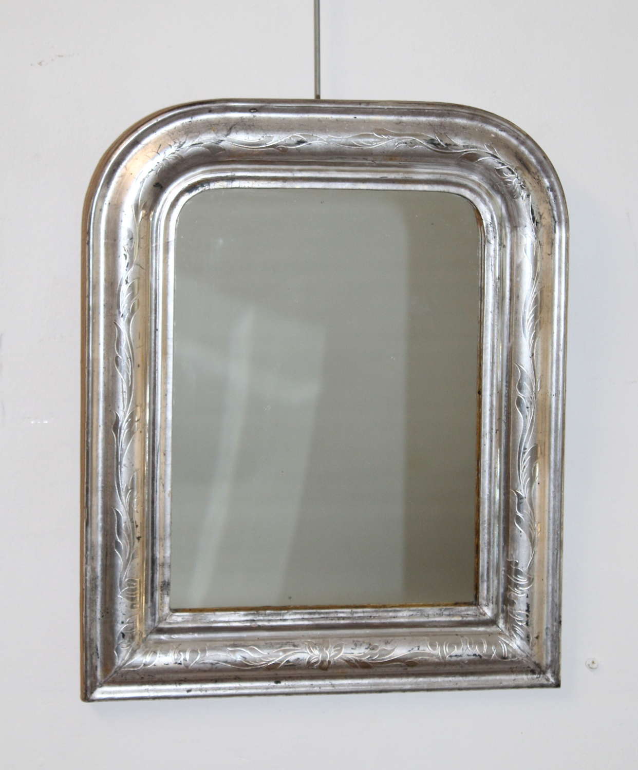Small antique French silverleafed archtop mirror