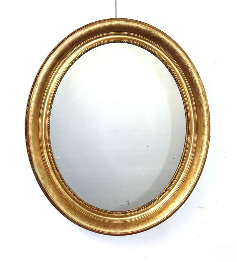 Antique French etched gilt oval mirror