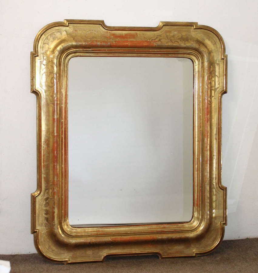 Magnificent antique Italian mirror with wide gilt frame
