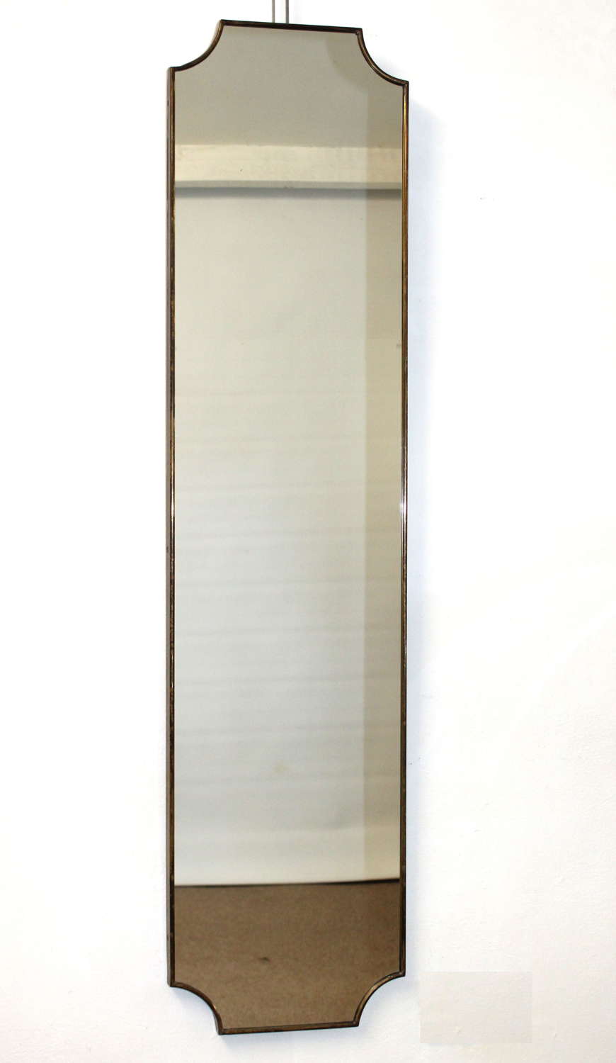 Tall and narrow Vintage Italian mirror with brass frame