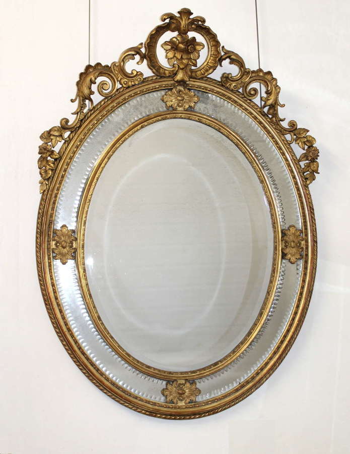 Magnificent decorative French antique oval mirror