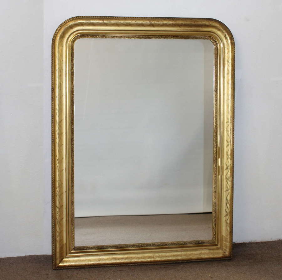 Antique French archtop mirror with beautifully etched frame
