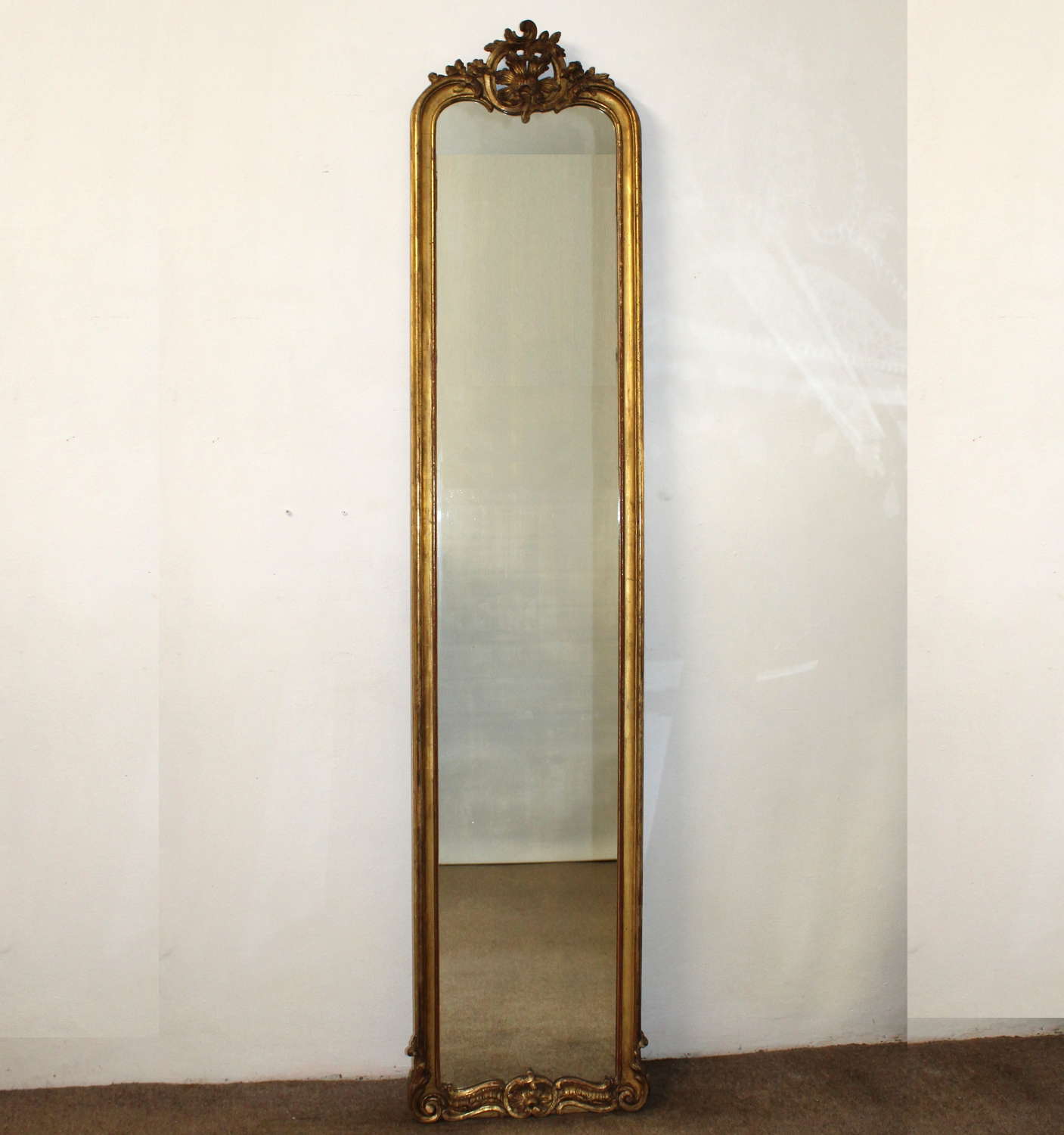 Exceptionally tall narrow antique French giltwood mirror