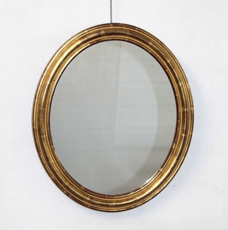 Antique French watergilt oval mirror