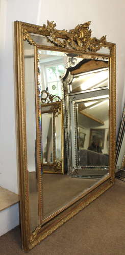 Magnificent very large antique French decorative cushioned mirror