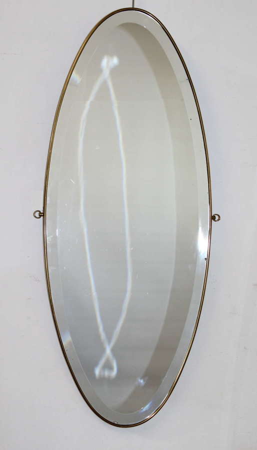 Mid-century modern brass-framed Italian oval mirror