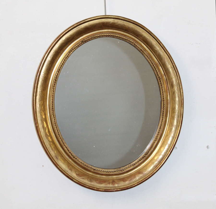 Antique French etched gilt oval mirror