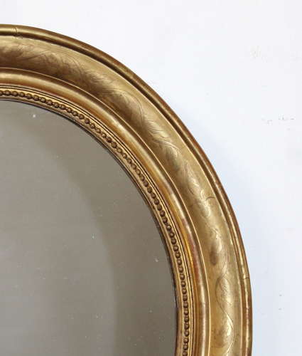 Antique French etched gilt oval mirror