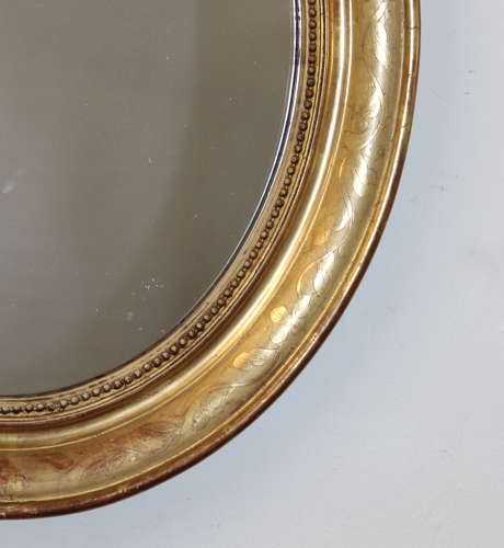 Antique French etched gilt oval mirror