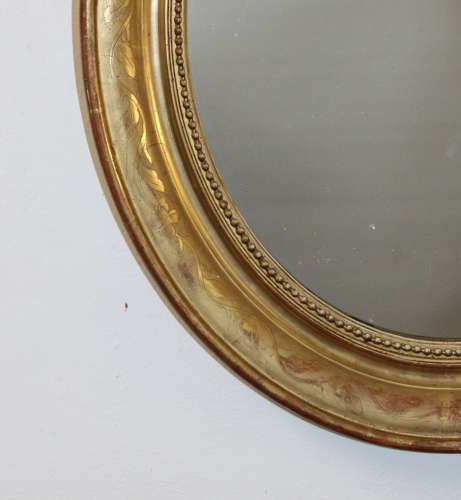 Antique French etched gilt oval mirror