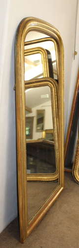 Large antique French curved top mirror with key pattern design