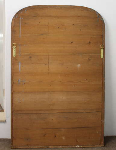 Large antique French curved top mirror with key pattern design