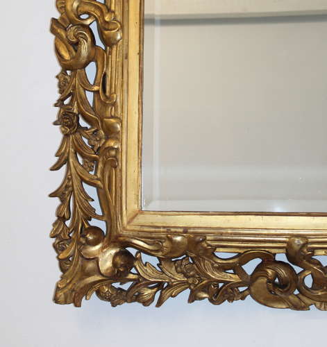 Magnificent antique Florentine giltwood mirror