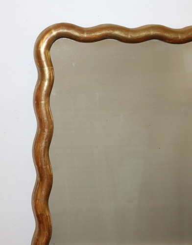 Pair of antique French gilt mirrors with wavy frames