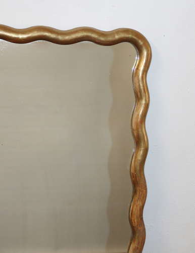 Pair of antique French gilt mirrors with wavy frames