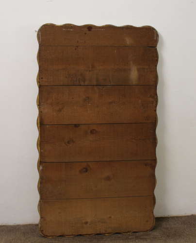 Pair of antique French gilt mirrors with wavy frames