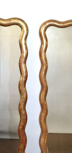 Pair of antique French gilt mirrors with wavy frames