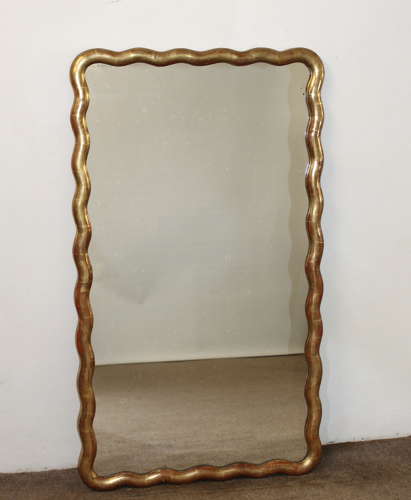 Pair of antique French gilt mirrors with wavy frames