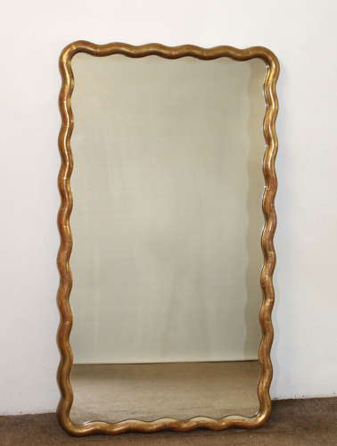 Pair of antique French gilt mirrors with wavy frames