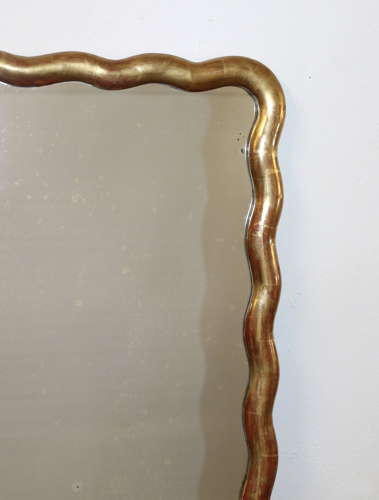 Pair of antique French gilt mirrors with wavy frames