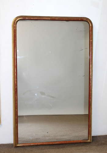 Antique French arched mirror with narrow gilt frame