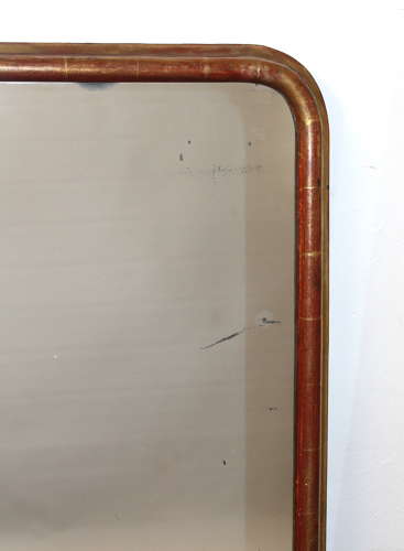 Antique French arched mirror with narrow gilt frame