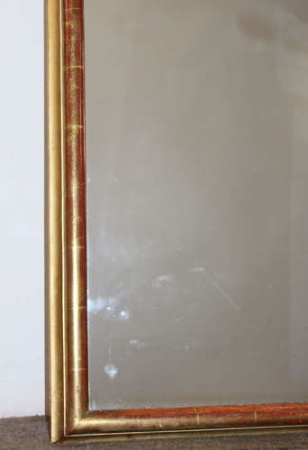 Antique French arched mirror with narrow gilt frame