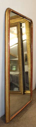Antique French arched mirror with narrow gilt frame