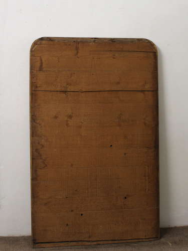 Antique French arched mirror with narrow gilt frame
