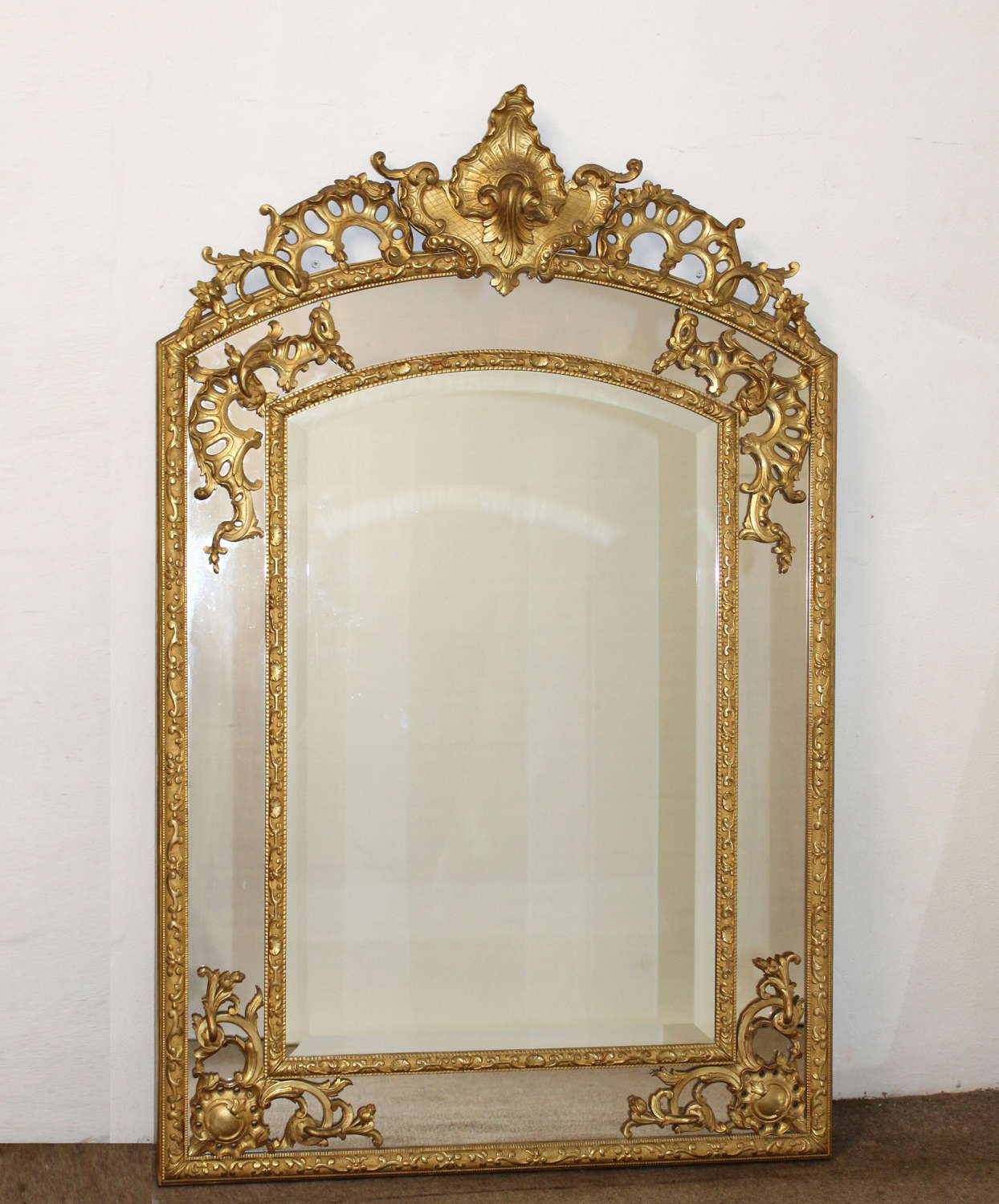 Decorative antique French giltwood margin mirror