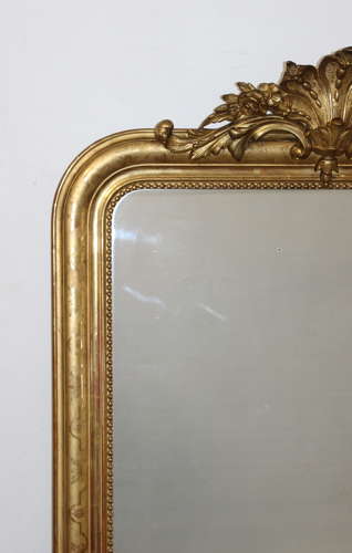 Antique French gilt archtop mirror with cartouche