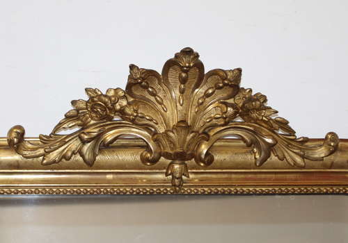 Antique French gilt archtop mirror with cartouche
