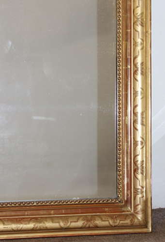 Antique French gilt archtop mirror with cartouche