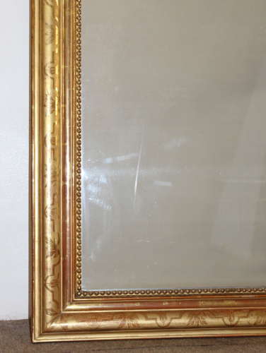 Antique French gilt archtop mirror with cartouche
