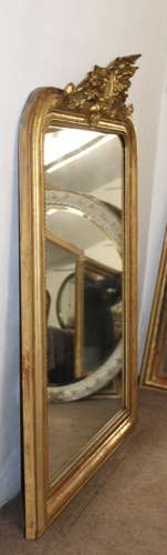 Antique French gilt archtop mirror with cartouche