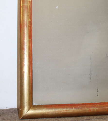 Antique French watergilt-framed archtop mirror