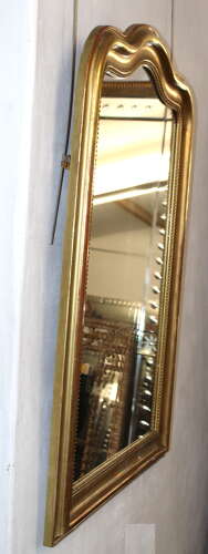 Antique French serpentine top banded gilt mirror