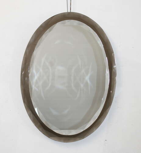 Vintage Italian oval mirror with geometric bevelling