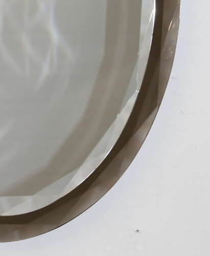 Vintage Italian oval mirror with geometric bevelling