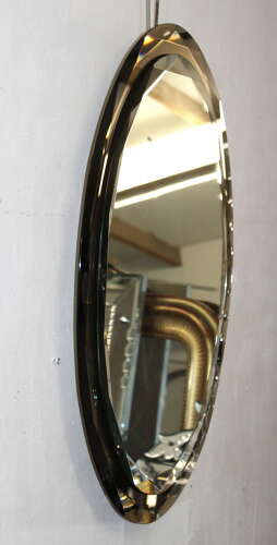 Vintage Italian oval mirror with geometric bevelling