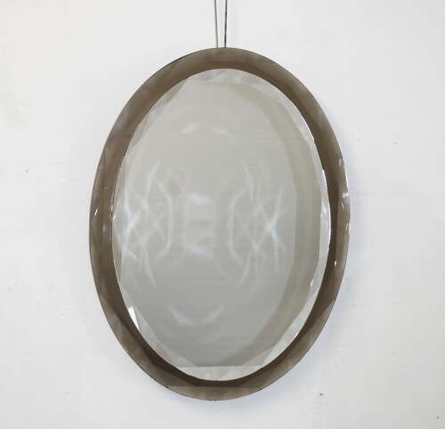Vintage Italian oval mirror with geometric bevelling