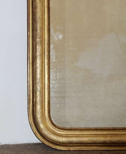 Pair of antique French mirrors with curved corners