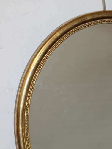 Antique French oval mirror with watergilt frame
